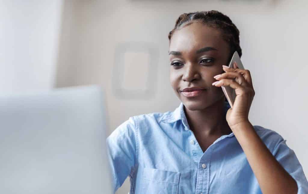 Woman smiling on the phone